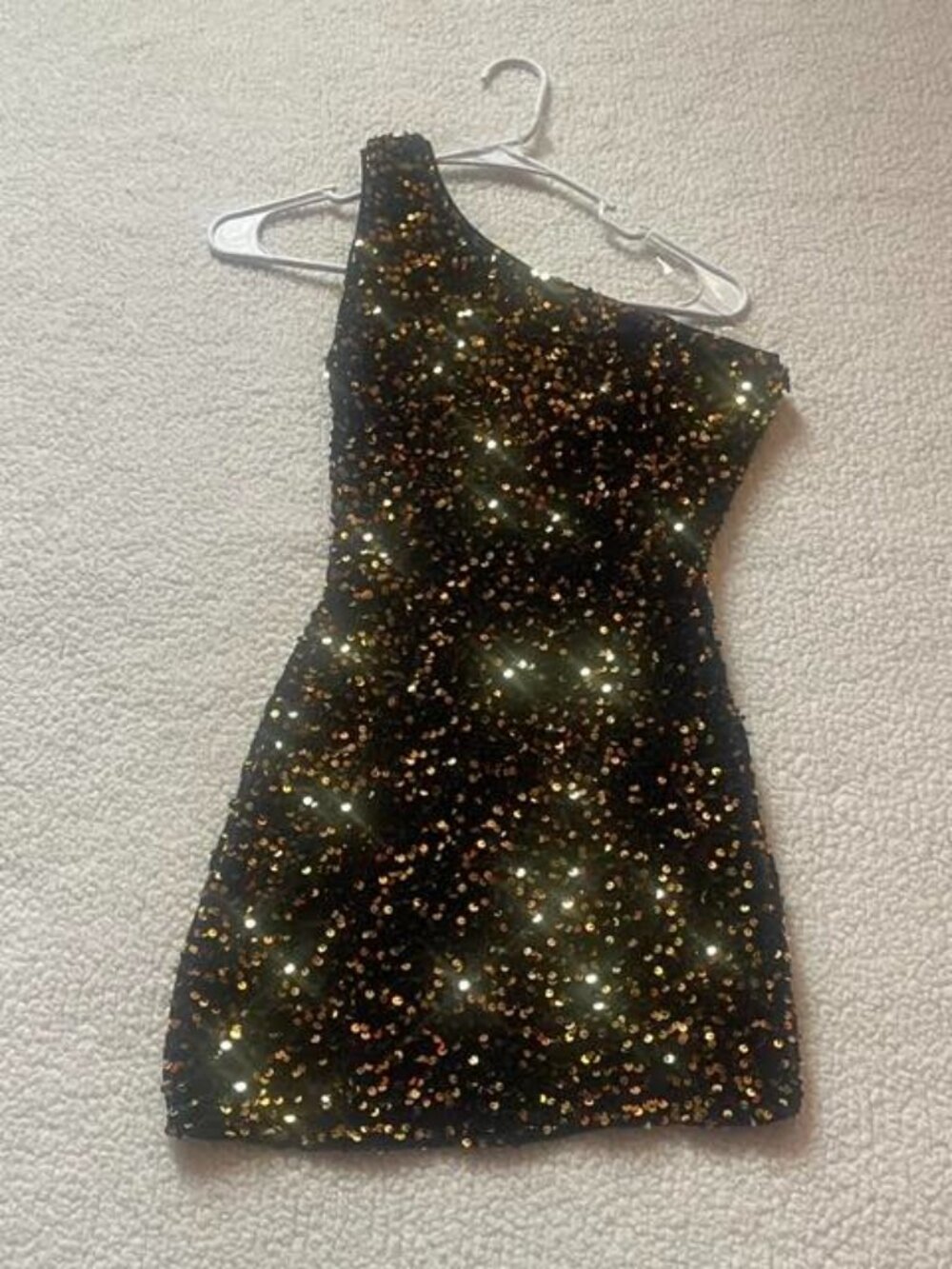 Black and gold sequin dress